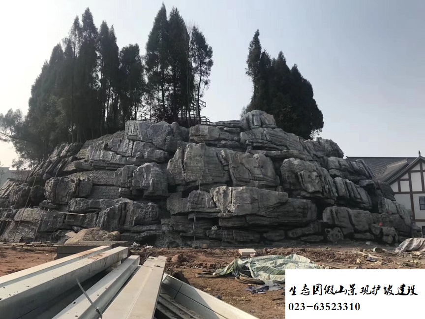 生態(tài)園假山餐廳主題塑石假山造型圖片