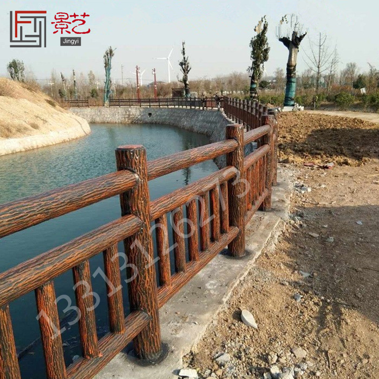 河北水泥仿樹皮欄桿廠家 河道景區(qū)護欄報價