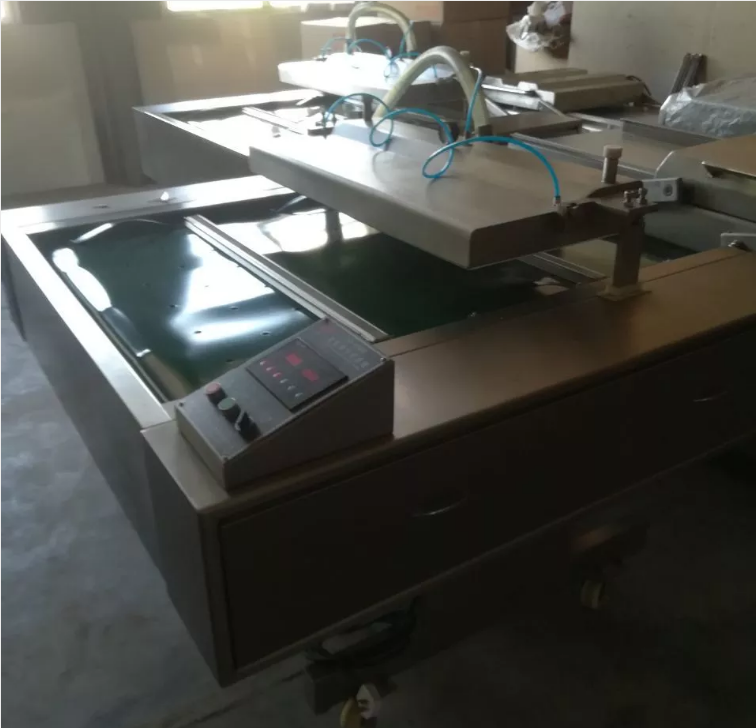 連續(xù)滾動(dòng)式真空包裝機(jī)廠家_真空包裝機(jī)供應(yīng)商