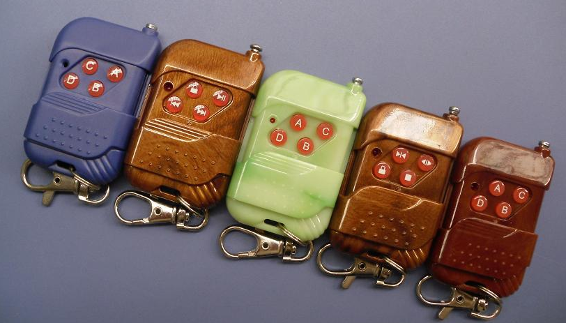 供應桃木對拷自拷貝遙控手柄卷簾門伸縮門道閘遙控器