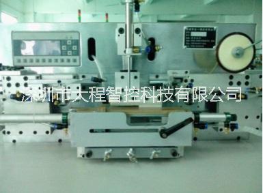 數(shù)碼電池貼膠機(jī)，貼膜機(jī)，包膠機(jī) 深圳電池貼膠機(jī)