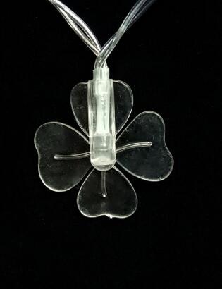 20led彩燈閃燈串燈 四葉草臥室宿舍裝飾燈 花類電池?zé)舸畮づ駸?  title=