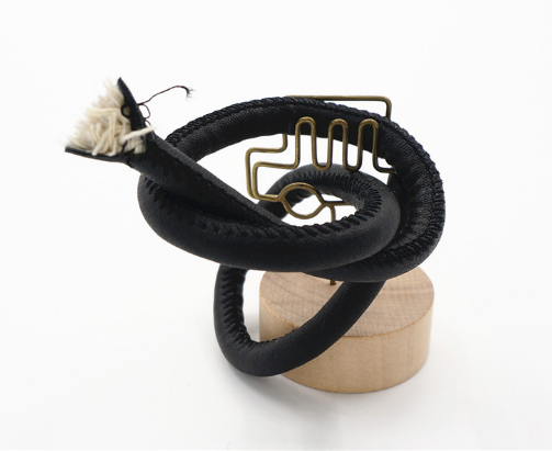 批發(fā)供應8MM包棉芯車線皮革圓條鎖邊PU帶子手袋挽手鞋子合縫帶子