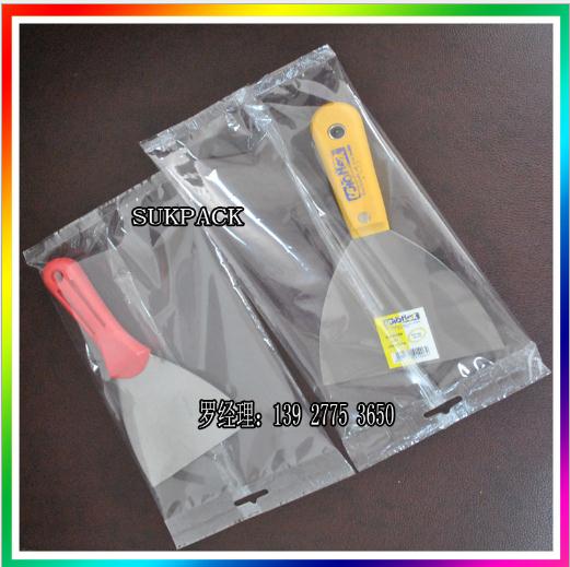 裝修鏟刀包裝機 油灰刀套膜機 三角刀套袋機 刮灰刀包裝機