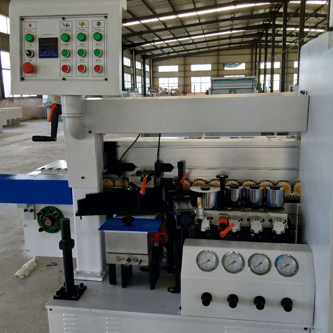 南興款封邊機(jī)櫥柜衣柜裝飾板材生態(tài)板封邊機(jī)