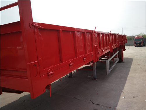 梁山掛車廠出售訂做13米標(biāo)箱側(cè)翻自卸半掛車