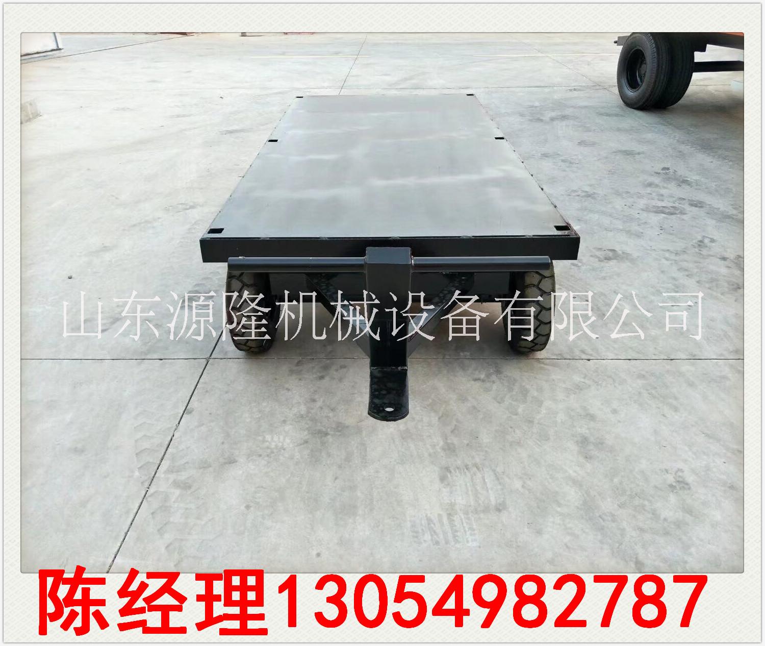 源隆定做輕巧型廠區(qū)手動平板拖車 手動叉車牽引兩用運輸車