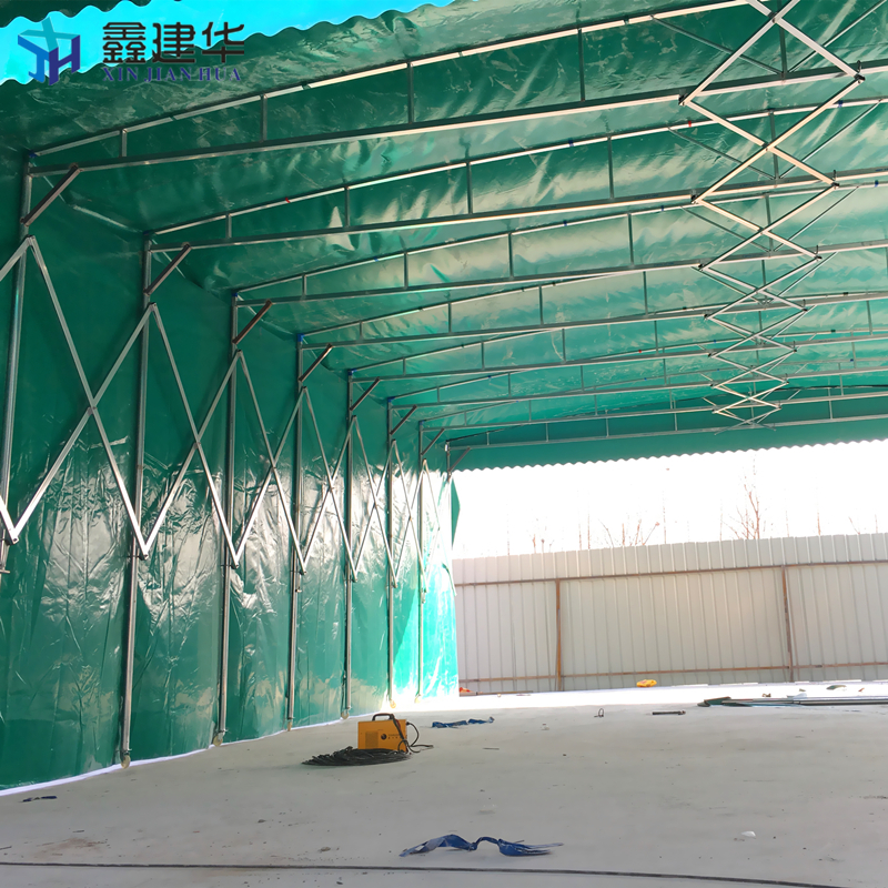 青島倉儲(chǔ)防火推拉棚定制廠家_室外防雨遮陽電動(dòng)伸縮雨棚使用效果怎么樣