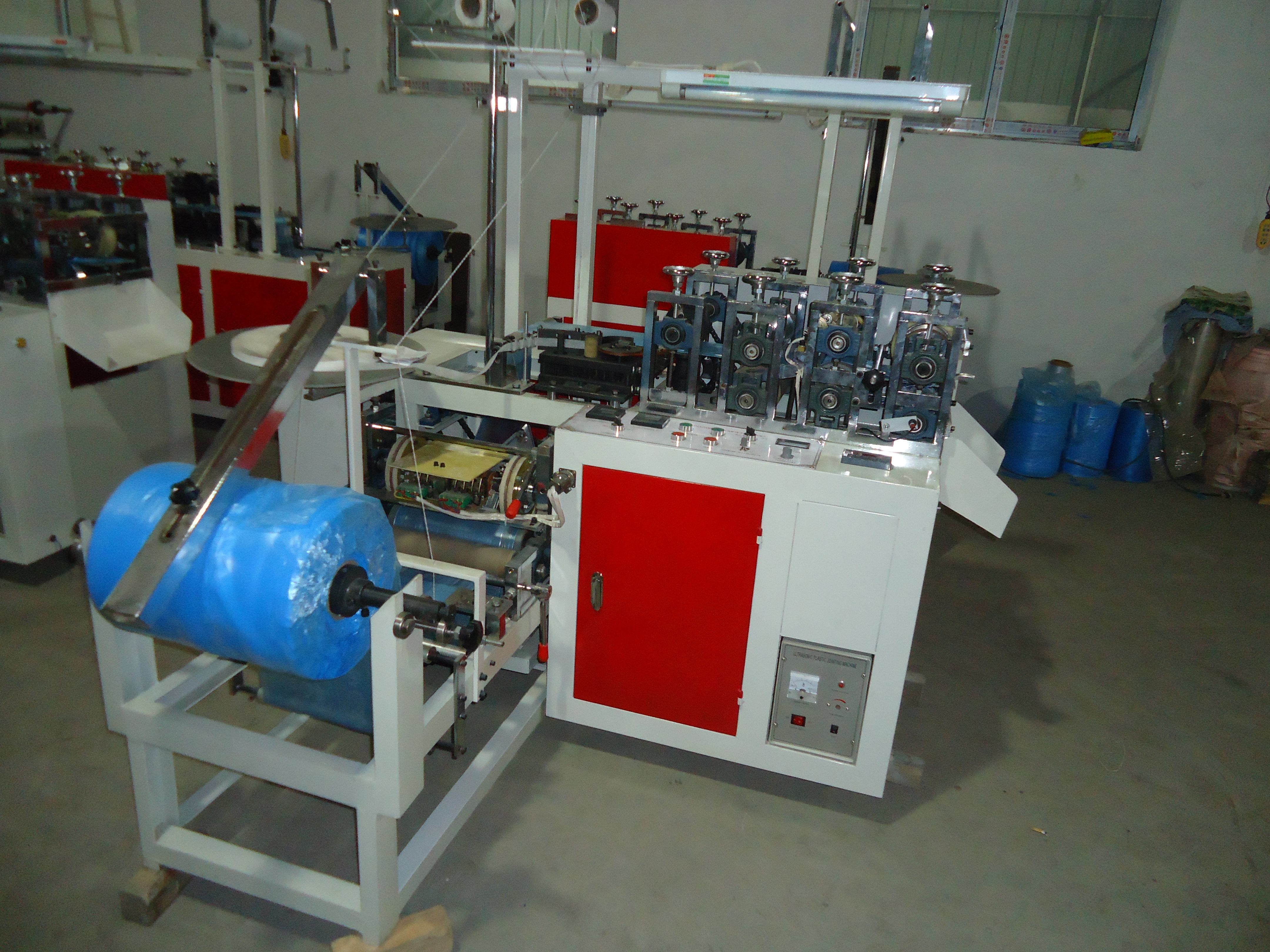 雙層鞋底塑料鞋套制造機(jī) 鞋底塑料鞋套制造機(jī)