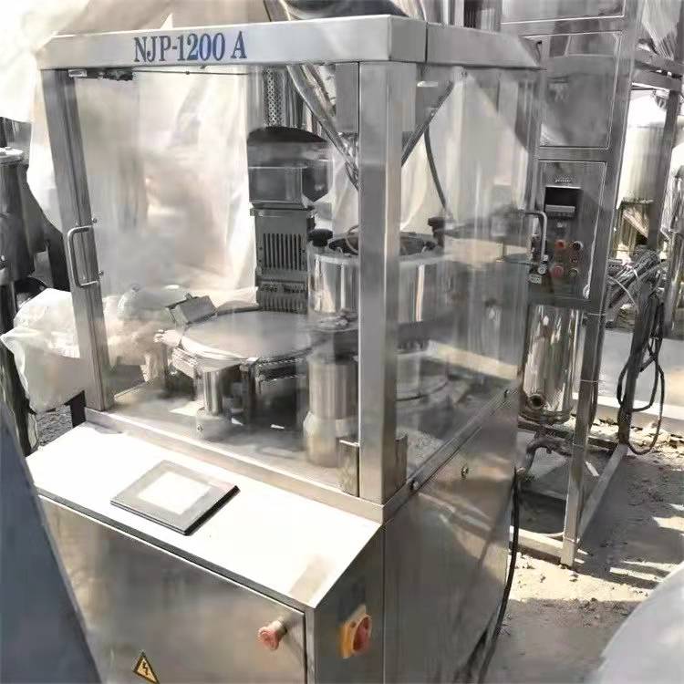 二手不銹鋼充填機(jī) 二手j囊充填機(jī) 二手真空填充機(jī) 1200jiao囊充填機(jī) 顆粒灌裝機(jī) 鵬達(dá)二手設(shè)備